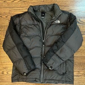 The north face boy puffy jacket. Black and grey.
